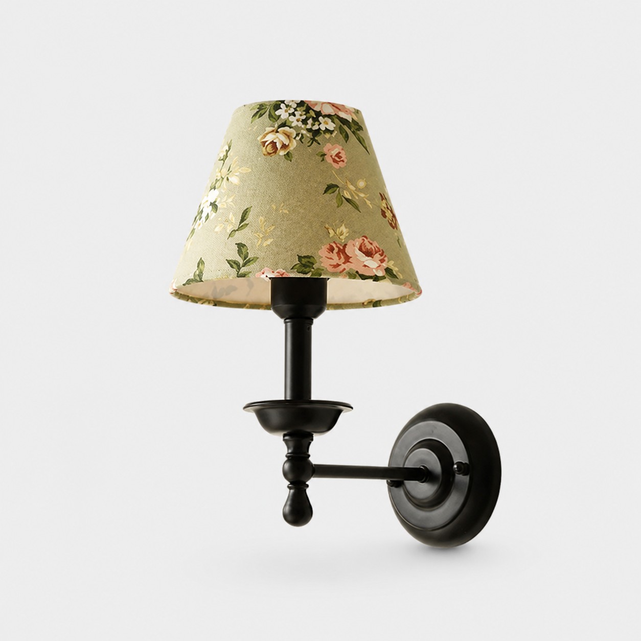 Conical shade wall sconce with wrought iron lamp stand in green floral shade