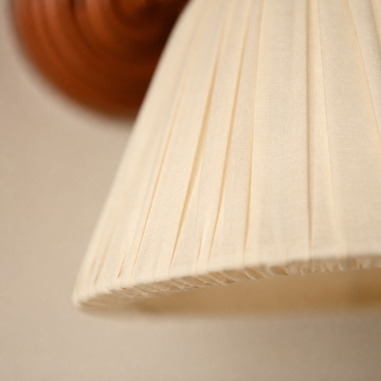 Pleated fabric shade edge close-up
