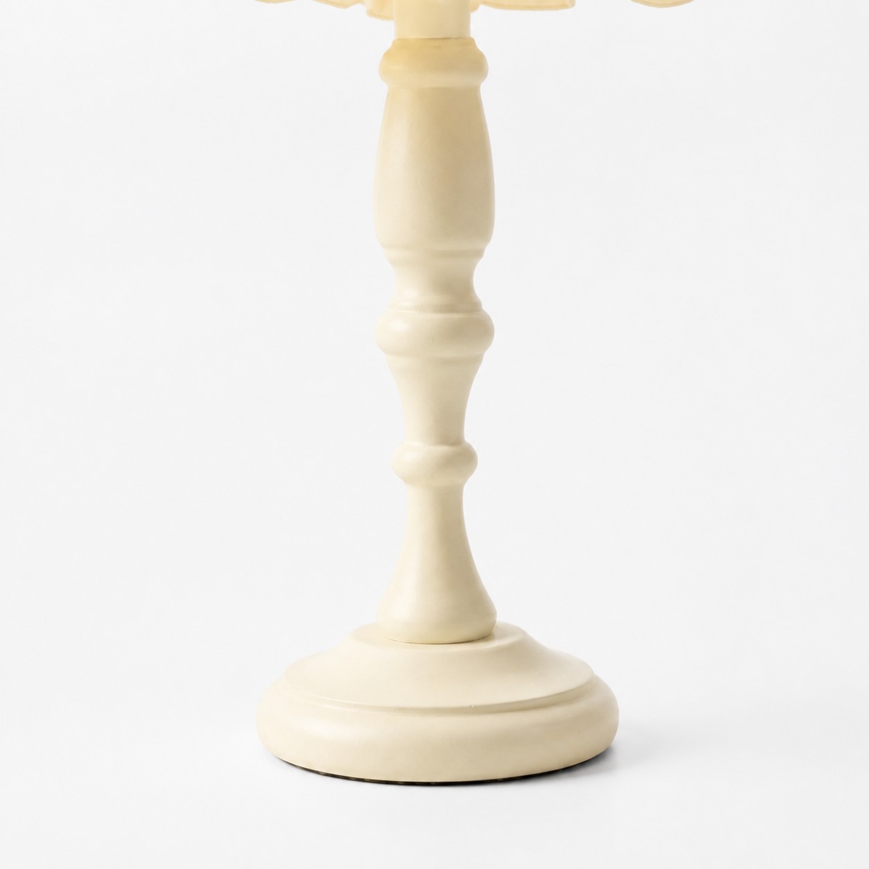Smooth turned wood table lamp base detail