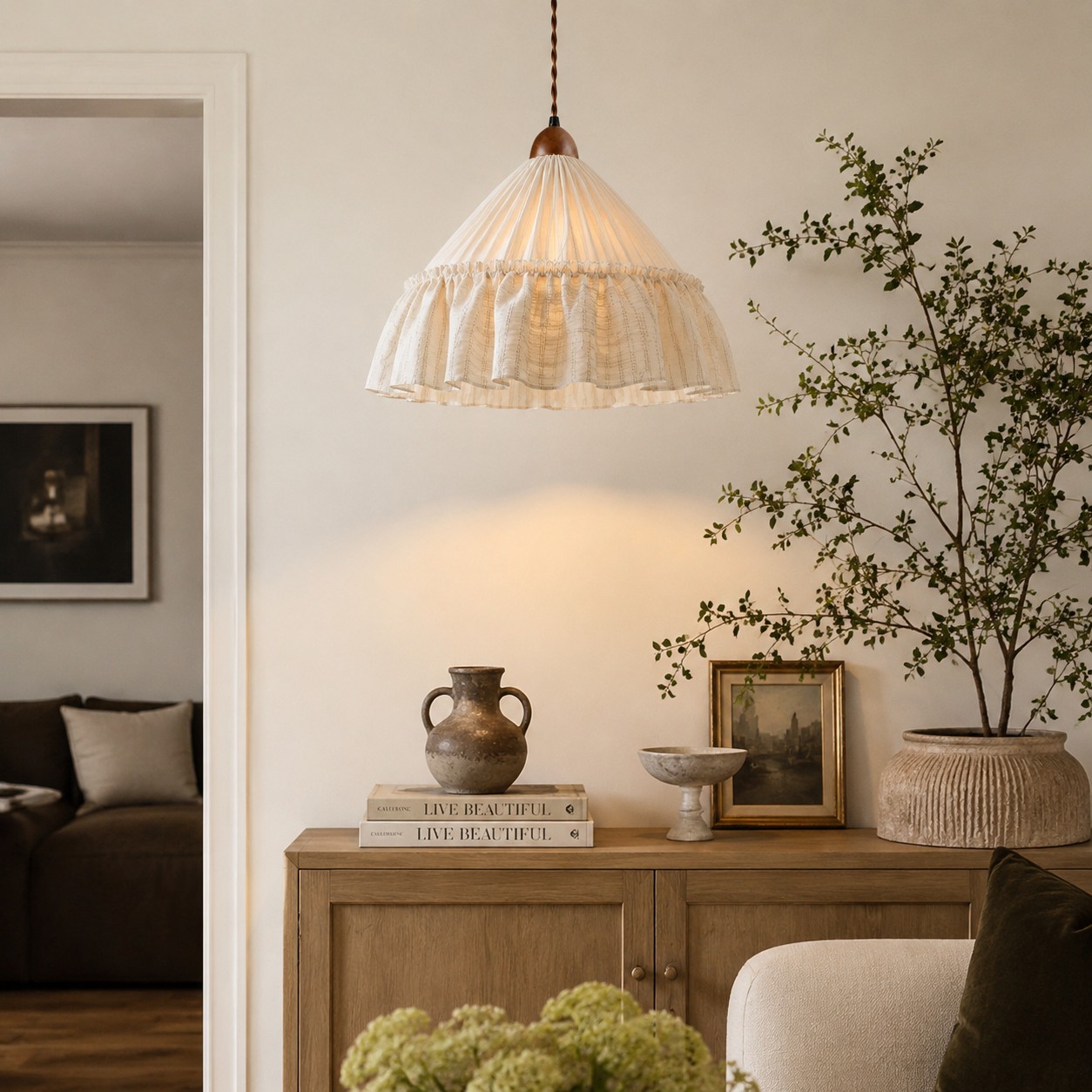 Ruffled pendant above a round dining table