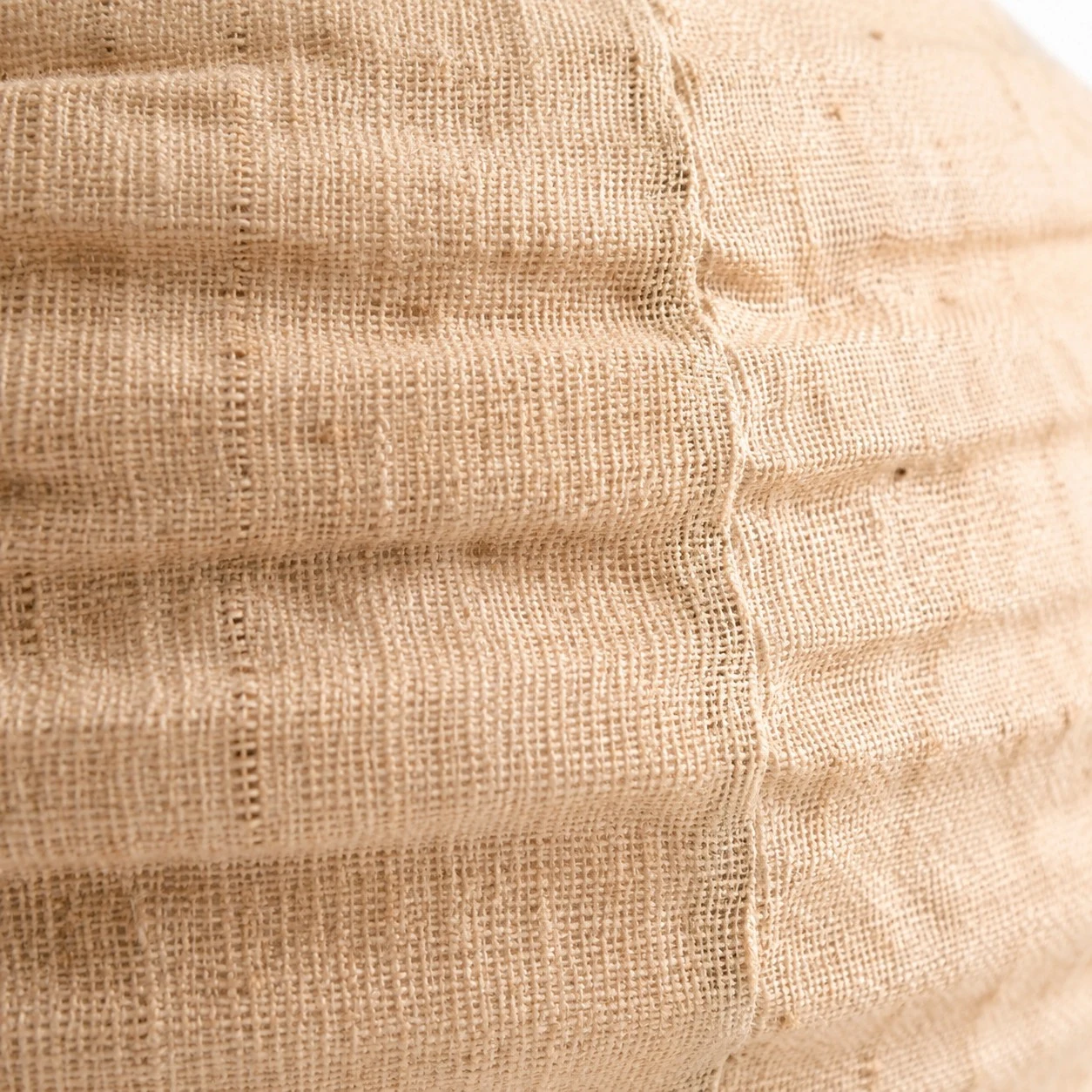 Close view of cotton-linen shade weave and stitched seam