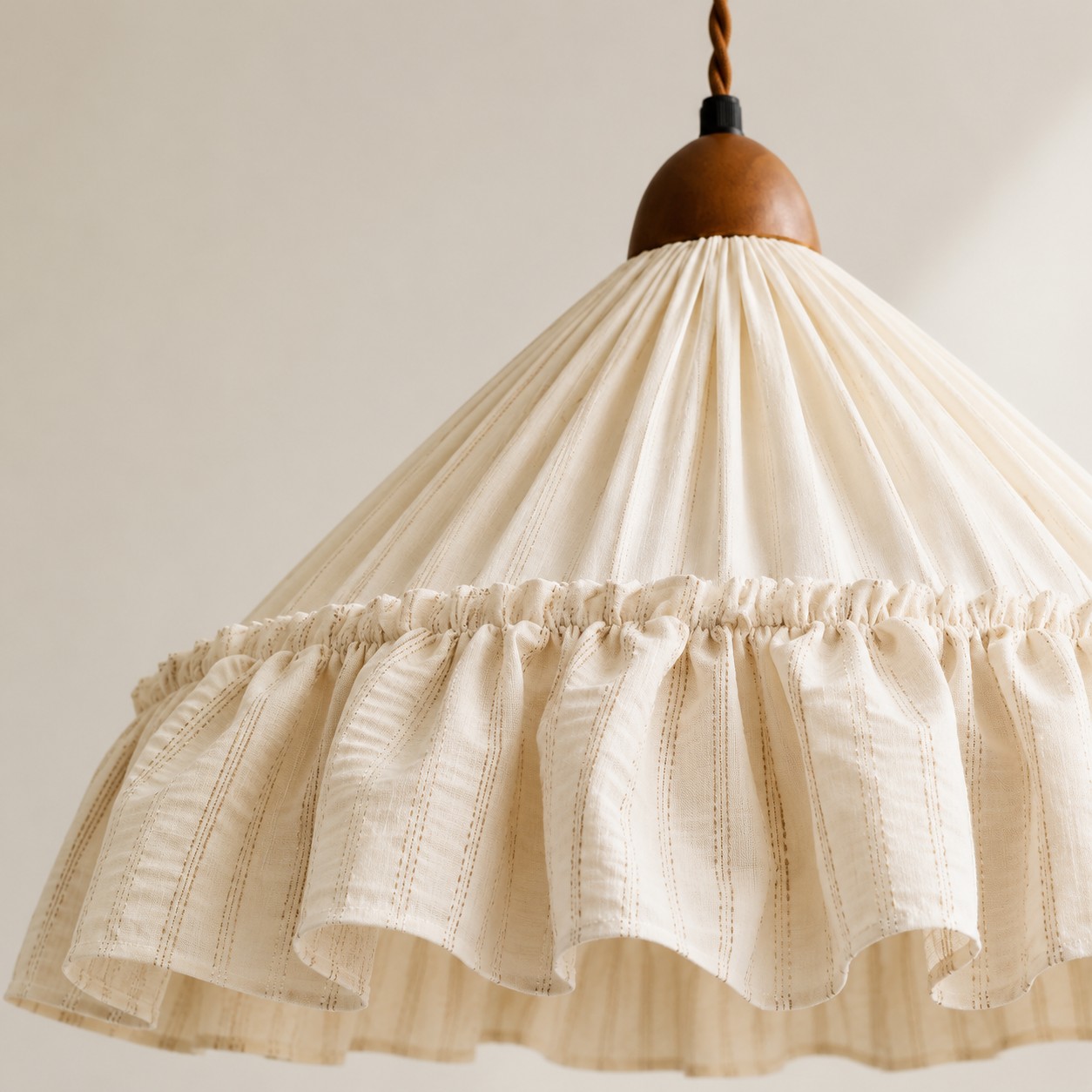 Pleated fabric and wrapped cord detail