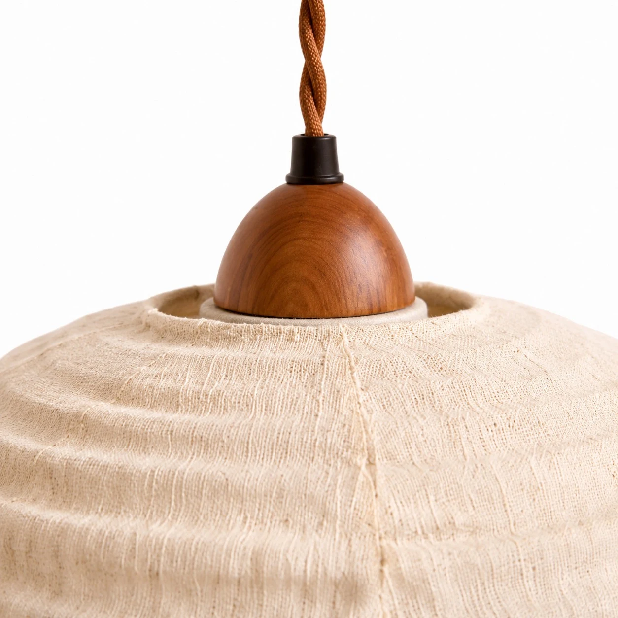 Close view of the wood top detail and braided cord